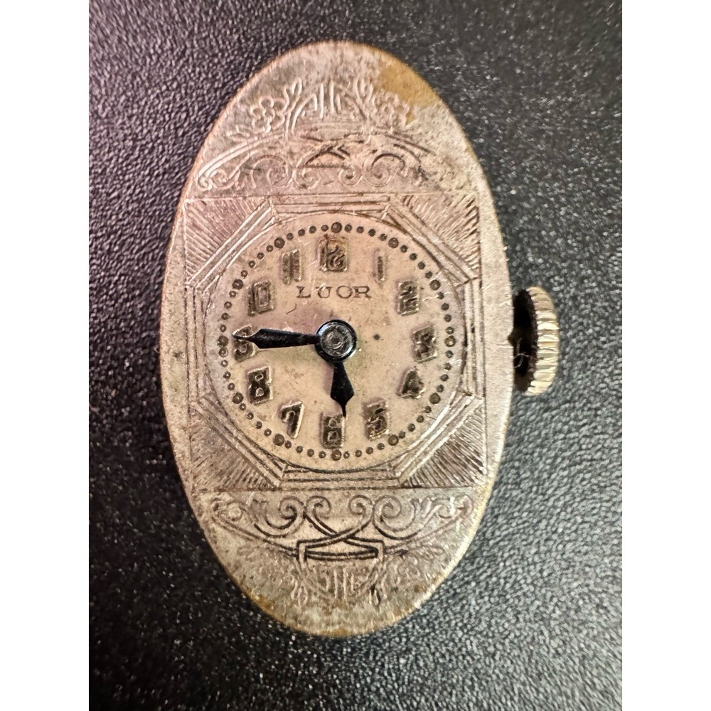 Vintage Swiss Made LUOR ladies' WatchMovement with engraved silver-toned‎ case